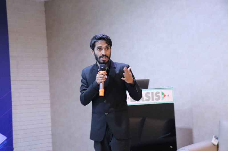 Delwar Alam on stage at an industry event