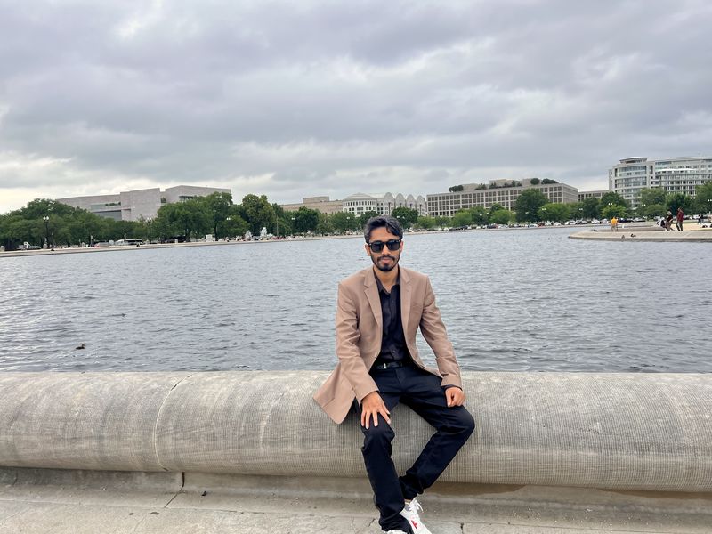 Delwar Alam by a lakeside